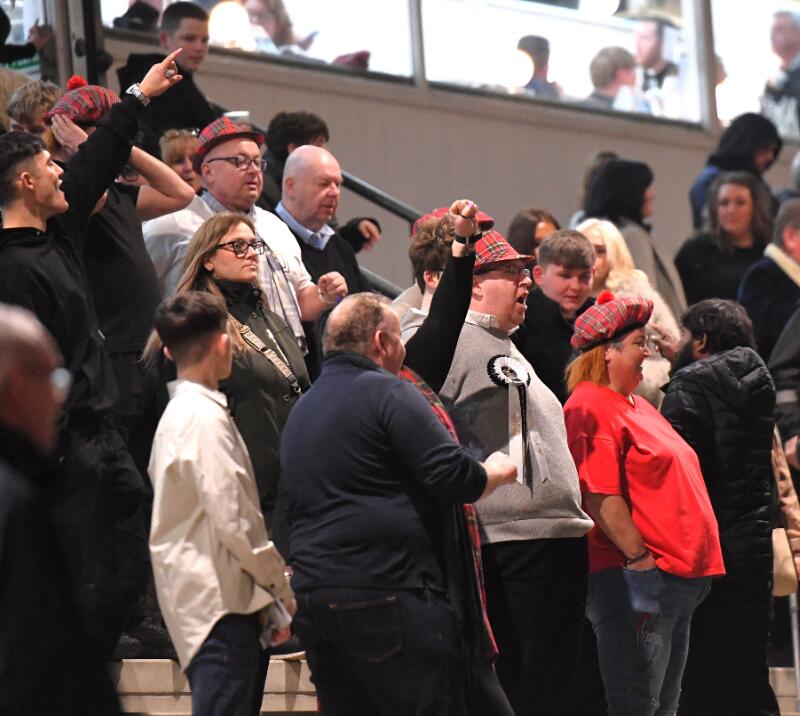 The crowd at Newcastle Greyhounds cheering during the race