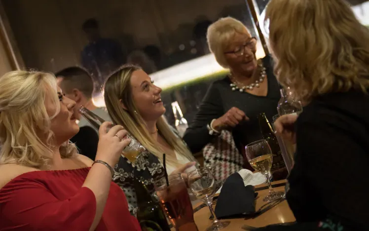 Hospitality guests at Newcastle greyhounds enjoy their table